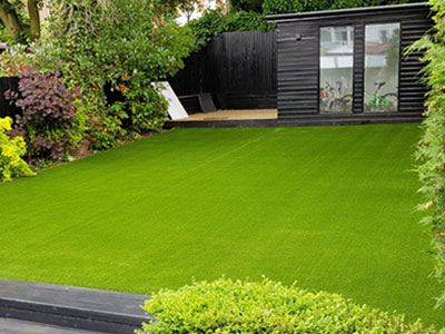 Artificial grass installation on a residence lawn in Bexley