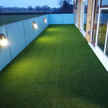 Artificial grass insallation in a Merton residence