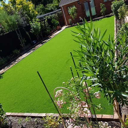 Synthetic grass insallation in a Harrow residence