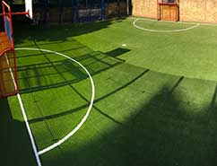 artificial grass mat at school basketball court